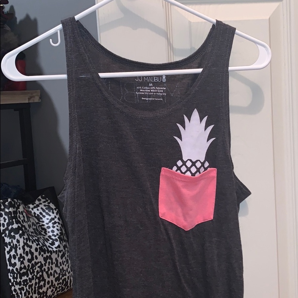 A gray JJ Malibu shirt